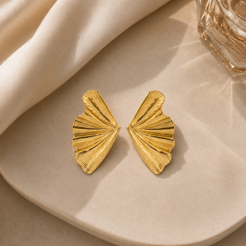 Title: Sculpted Wave Gold Earrings ✨
